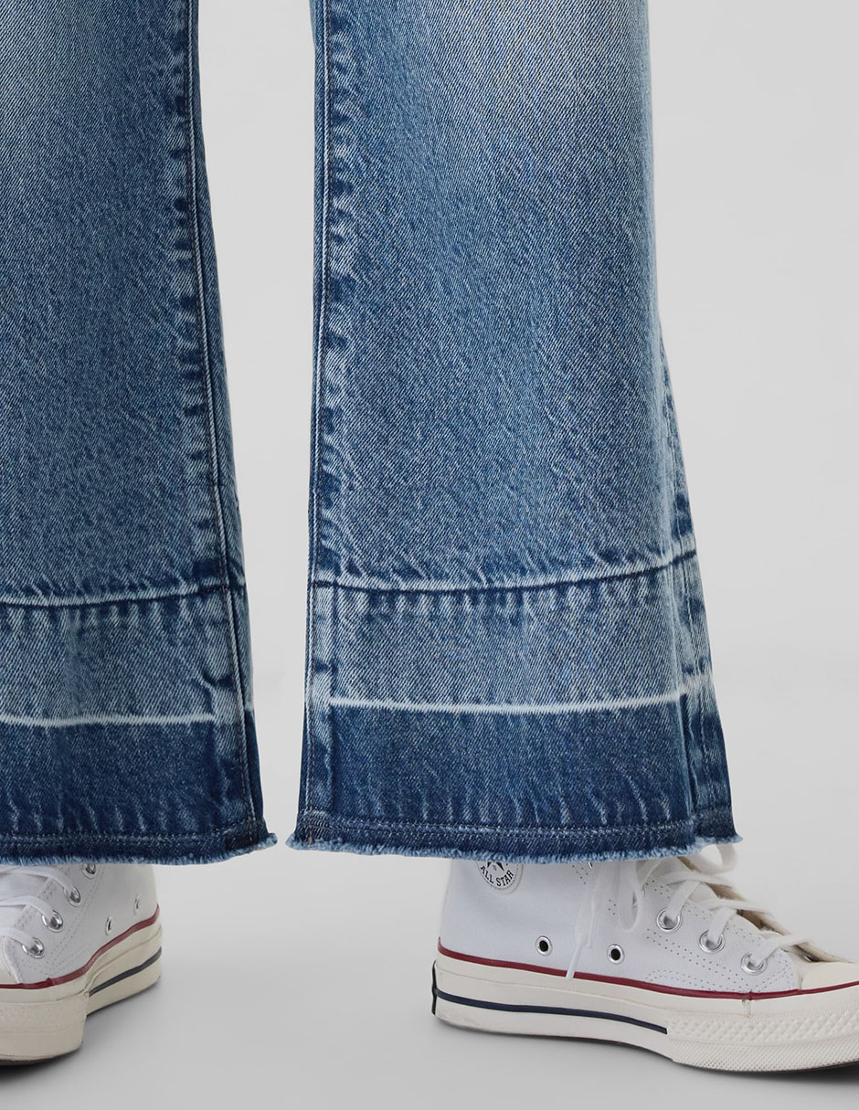 Jeans flare deslavado para niña 4